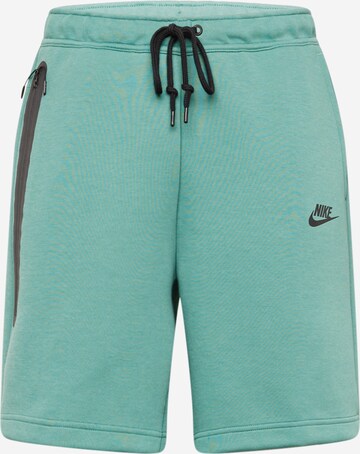 Pantaloni de la Nike Sportswear pe verde: față