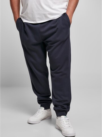 Urban Classics Tapered Trousers in Blue: front