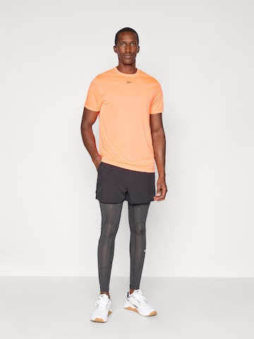 Reebok Funkční tričko 'ID TRAIN' – oranžová