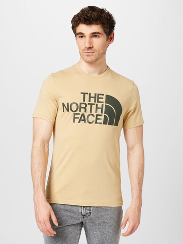 THE NORTH FACE Μπλουζάκι σε κίτρινο: μπροστά