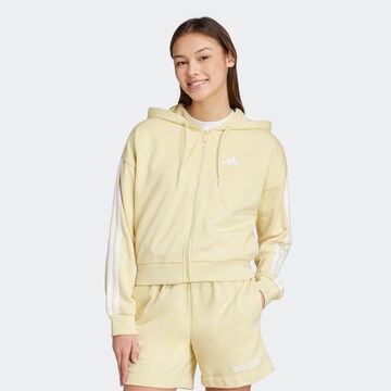 ADIDAS SPORTSWEAR Sports sweat jacket 'Essentials' in Yellow: front