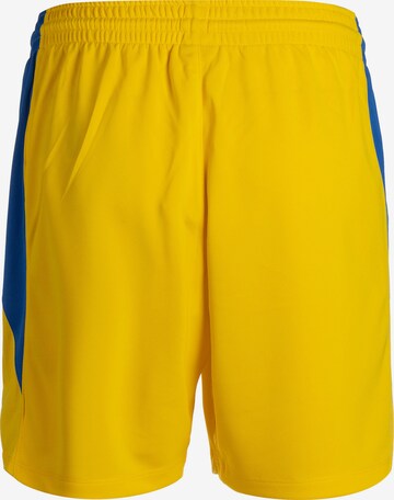Loosefit Pantaloni sportivi di NIKE in giallo