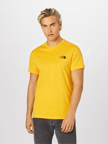 THE NORTH FACE Regularny krój Koszulka 'Simple Dome' w kolorze żółty: przód