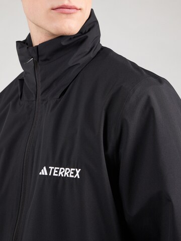 juoda ADIDAS TERREX Laisvalaikio striukė 'Essentials'