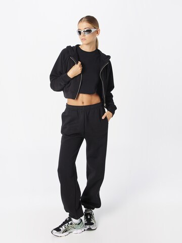 Tapered Pantaloni de la Champion Authentic Athletic Apparel pe negru