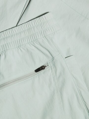 MAMMUT Tapered Outdoor Pants in Green