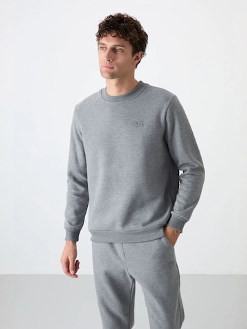 Tommy Life Joggingpak in Grijs
