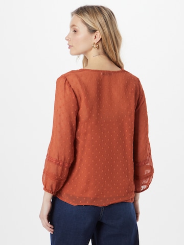 ABOUT YOU Blouse in Bruin