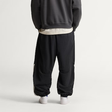 ADIDAS ORIGINALS - Tapered Pantalón 'AdiSignature Vista Wind' en negro