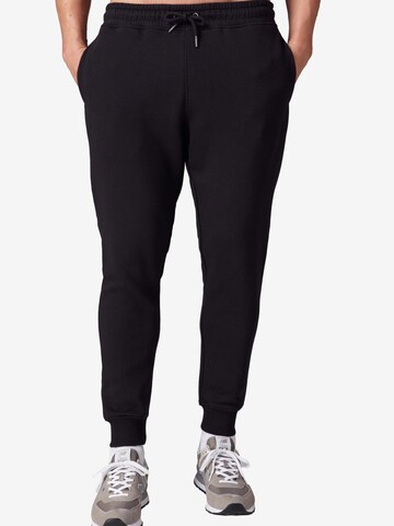 Next Tapered Trousers in Blue: front