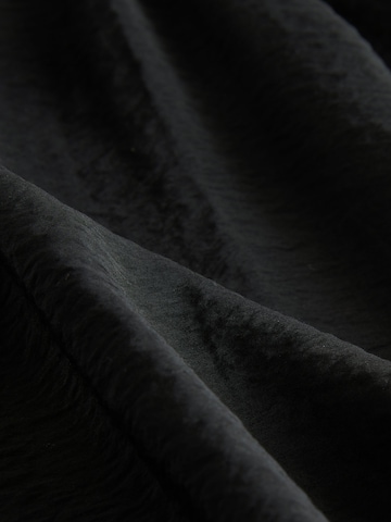 Next - Loosefit Pantalón en negro