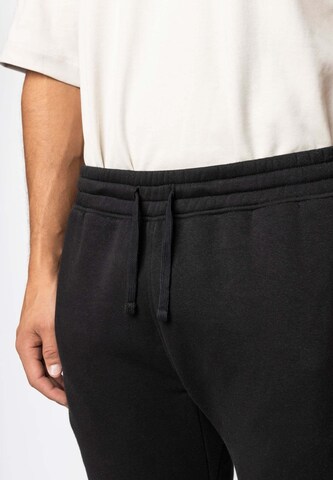 Effilé Pantalon SNOCKS en noir