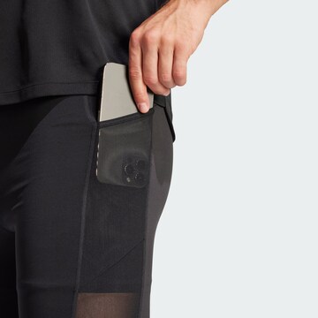 Slimfit Pantaloni sportivi 'Run It' di ADIDAS PERFORMANCE in nero