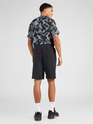 Loosefit Pantaloni 'Adicolor Outline Trefoil' di ADIDAS ORIGINALS in nero