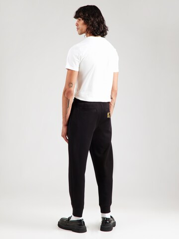 ARMANI EXCHANGE Tapered Housut värissä musta