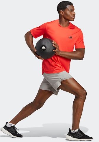 ADIDAS SPORTSWEARTehnička sportska majica 'Designed For Movement' - narančasta boja