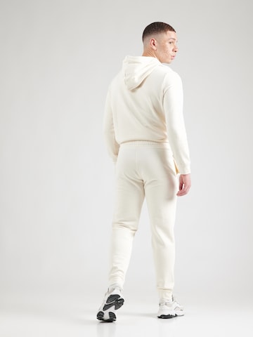 balta PUMA Siaurėjantis Sportinės kelnės 'ESS': galas