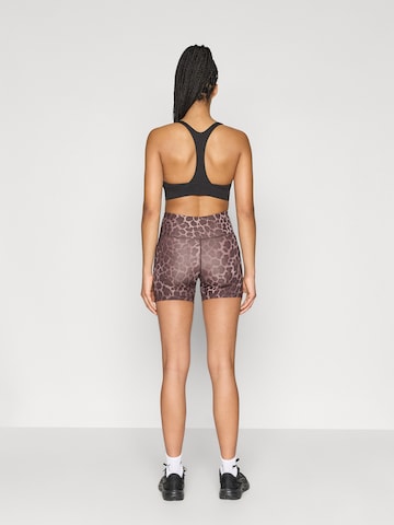 Skinny Pantaloni sport 'Essential' de la PUMA pe maro