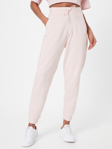 PUMA Tapered Sports trousers 'Her' in Pink: front