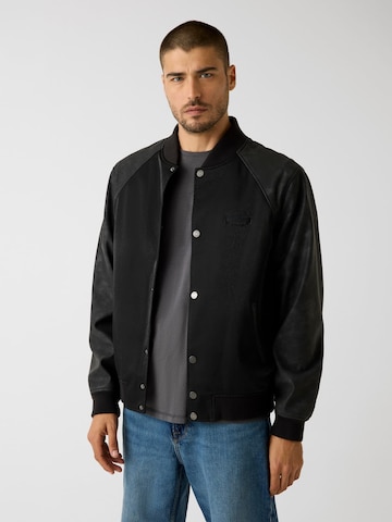 GUESS Between-Season Jacket in Black: front