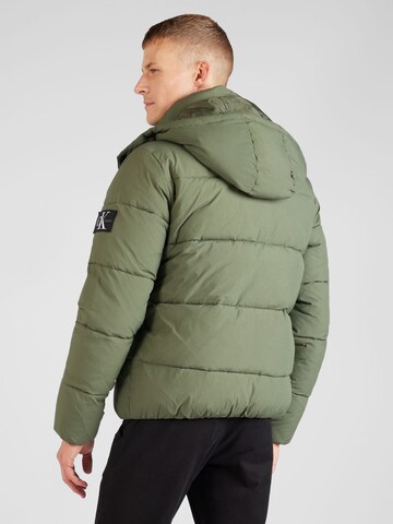 Calvin Klein Jeans Демисезонная куртка 'Essential' в Зеленый