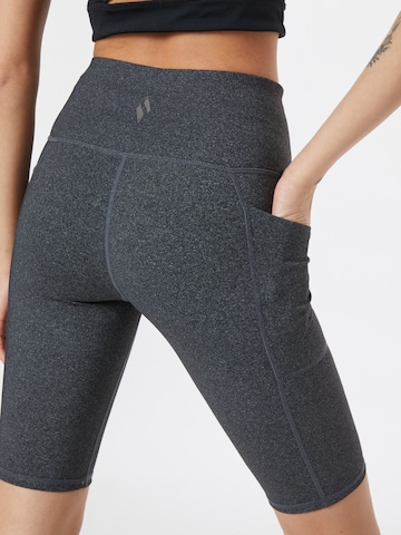 SKECHERS Skinny Workout Pants in Grey