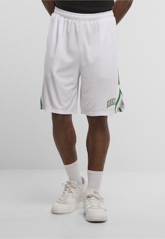 Karl Kani Regular Trousers 'College' in White: front