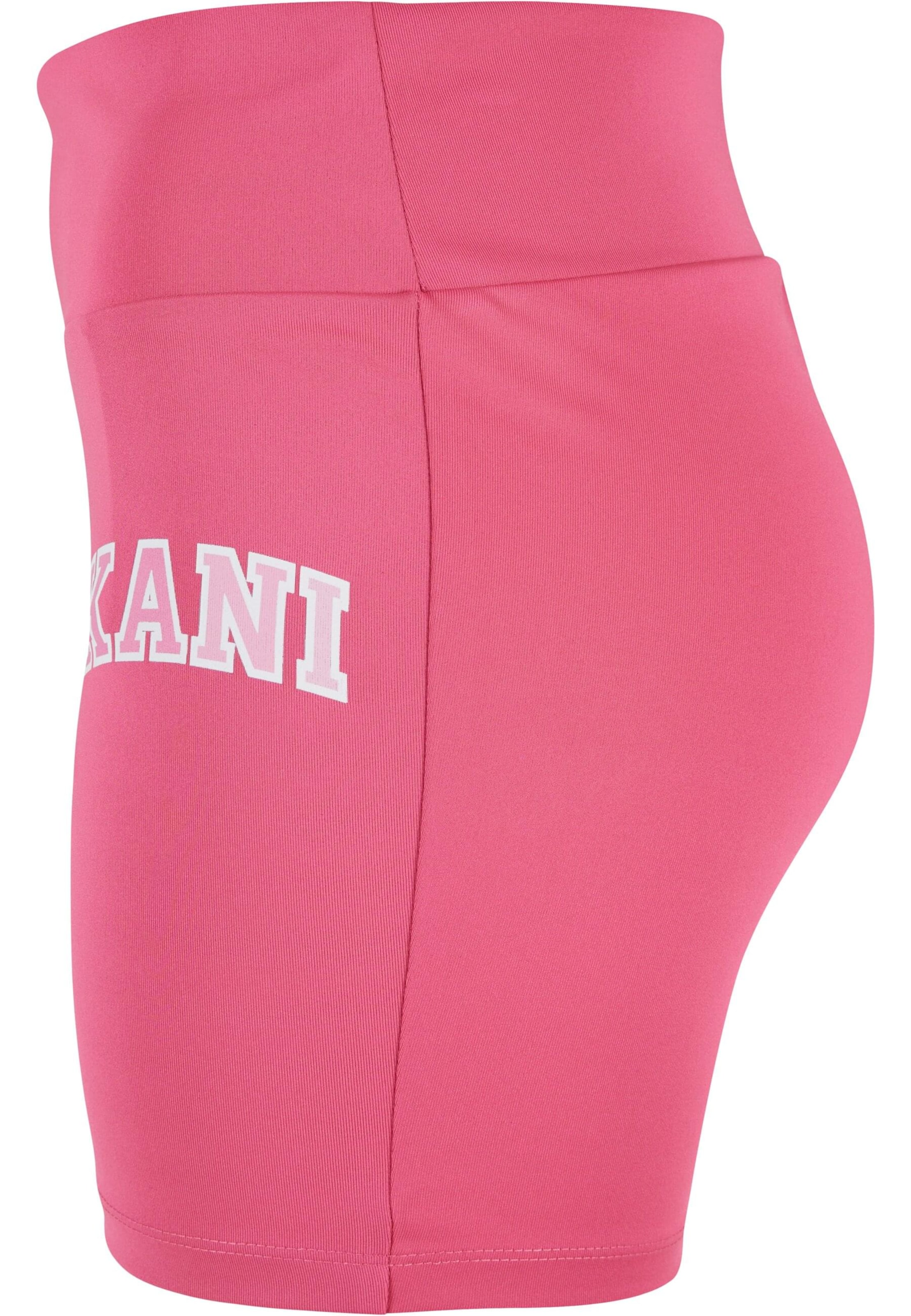 Skinny Pantaloni sportivi di Karl Kani in rosa