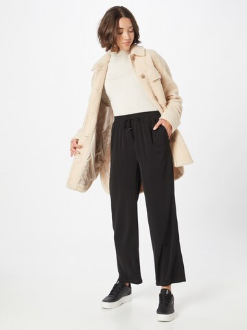 ABOUT YOU Loose fit Trousers 'Ida' in Black