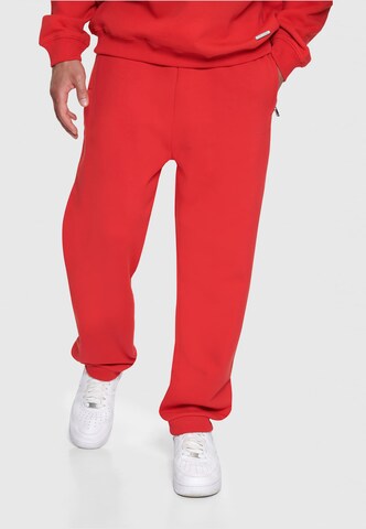 Dropsize Tapered Pants in Red: front