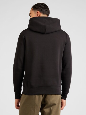 TOMMY HILFIGER Sweatshirt 'Arched Varsity' in Schwarz