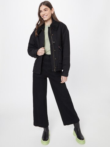 LEVI'S ® Between-Season Jacket 'Bubble Sherpa Trucker Jacket' in Black