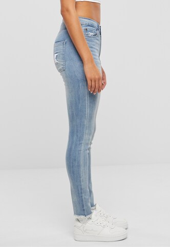 Skinny Jeans 'OG' di Karl Kani in blu