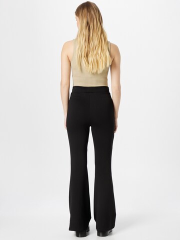 Evazați Pantaloni de la Monki pe negru