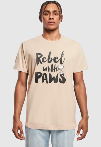 Merchcode Shirt 'Peanuts - Rebel with paws' in Beige: voorkant