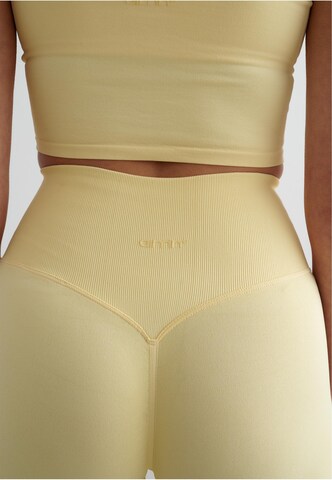 Aim'n - Skinny Pantalón deportivo en amarillo