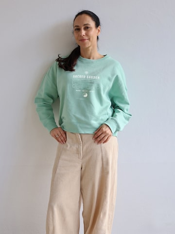 Kultgut Pullover 'Sacred Garden'‌‌‌ in Grün: Vorderseite