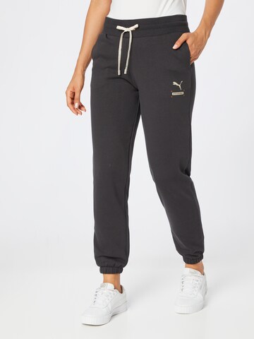 PUMA Tapered Sportbroek in Zwart: voorkant