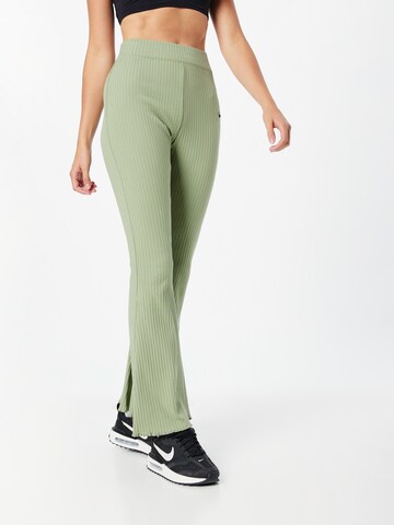 Nike Sportswear Flared Pants in Green: front