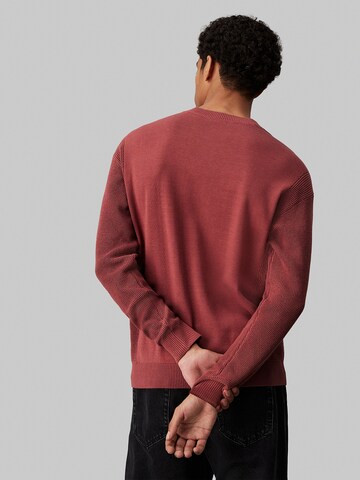 Pull-over Calvin Klein Jeans en rouge