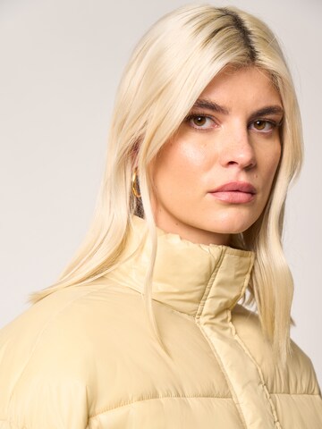 ABOUT YOU x Laura Giurcanu Winter jacket 'Alexia' in Beige