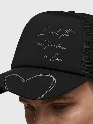 THE ODDS Hætte 'I Wish The Next Pandemic Is Love Trucker Cap/ LMTD edition' i sort: forside
