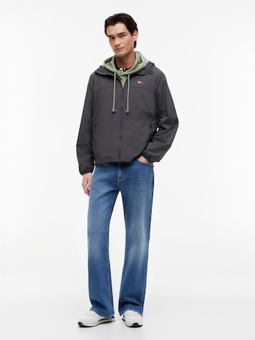 Tommy Jeans Tussenjas 'CHICAGO' in Grijs