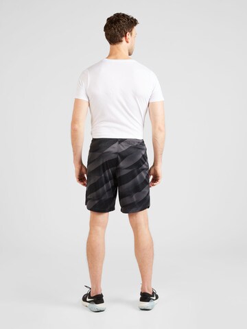 Regular Pantaloni sport de la NIKE pe gri