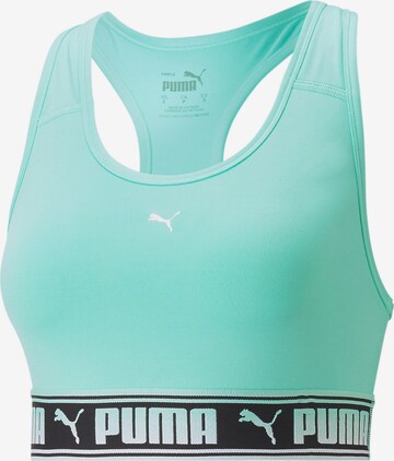 PUMA - Sujetador deportivo en verde: frente