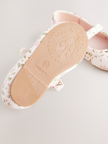 Next - Bailarina en blanco