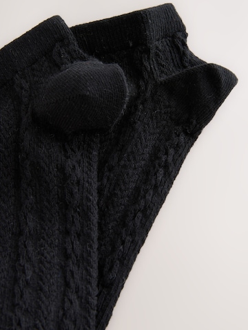 Next Sockor i svart