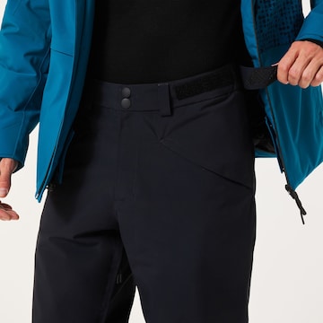 OAKLEY Regular Sports trousers 'CANOPY' in Black: front