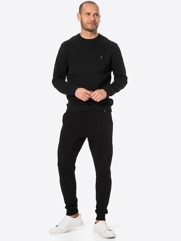 AllSaints Tapered Housut 'Raven' värissä musta