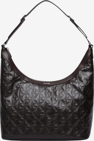Calvin Klein Shoulder bag 'EMBLEM AOP DEBOSSED MEDIUM SHBAG LV04F3875G' in Brown: front